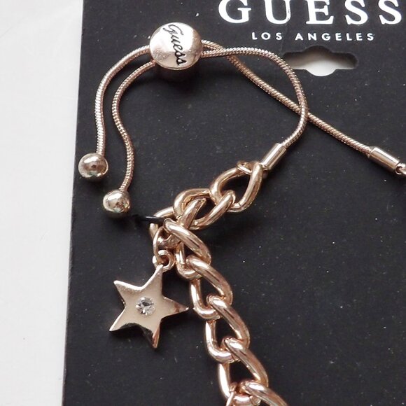 Guess Rose Gold colored Charm Bracelet Adjustable Cross Circle Pendant Star NWT - Picture 4 of 5